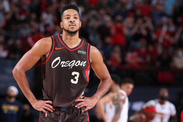 Portland Trail Blazers guard CJ McCollum plays during the first half of an NBA basketball game, Wednesday, March 31, 2021, in Detroit. (AP Photo/Carlos Osorio)