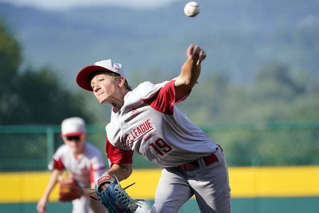 Sioux Falls, S.D.'s Gavin Weir (19) throws to a Torrance, Calif., batter during the first inning of a baseball game at the Little League World Series in South Williamsport, Pa., Wednesday, Aug. 25, 2021. South Dakota won 1-0. (AP Photo/Tom E. Puskar)