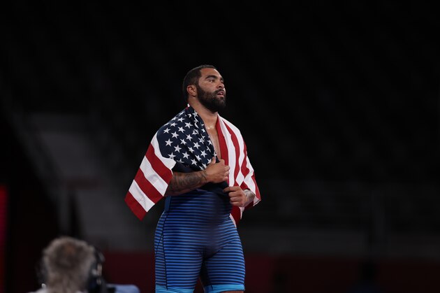 Wrestling: 2020 Summer Olympics: USA Gable Steveson victorious, wearing USA flag after Men's Freestyle 125kg Final at Makuhari Messe Hall. Steveson wins gold. Tokyo, Japan 8/6/2021 CREDIT: Simon Bruty (Photo by Simon Bruty/Sports Illustrated via Getty Images) (Set Number: X163746 TK2)
