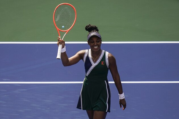Sloane Stephens, of the United States, waves to the crowd after defeating Madison Keys, of the United States, during the first round of the US Open tennis championships, Monday, Aug. 30, 2021, in New York. (AP Photo/Seth Wenig)