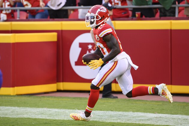 Kansas City Chiefs wide receiver Tyreek Hill celebrates after scoring a touchdown against the Minnesota Vikings during the first half of a preseason NFL football game, Friday, Aug. 27, 2021 in Kansas City, Mo. (AP Photo/Reed Hoffmann)