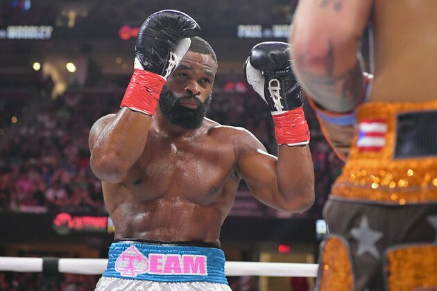 CLEVELAND, OHIO - AUGUST 29: Tyron Woodley fights Jake Paul in their cruiserweight bout during a Showtime pay-per-view event at Rocket Morgage Fieldhouse on August 29, 2021 in Cleveland, Ohio. (Photo by Jason Miller/Getty Images) CLEVELAND, OHIO - AUGUST 29: Tyron Woodley fights Jake Paul in their cruiserweight bout during a Showtime pay-per-view event at Rocket Morgage Fieldhouse on August 29, 2021 in Cleveland, Ohio. (Photo by Jason Miller/Getty Images)