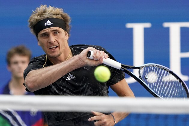 Alexander Zverev, of Germany, returns a shot to Albert Ramos-Vinolas, of Spain, during the second round of the US Open tennis championships, Thursday, Sept. 2, 2021, in New York. (AP Photo/Elise Amendola)