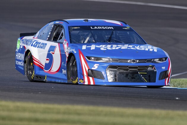 Kyle Larson (5) during qualifying for a NASCAR Cup Series auto race at Indianapolis Motor Speedway, Sunday, Aug. 15, 2021, in Indianapolis. (AP Photo/Doug McSchooler)