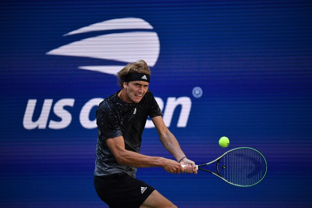 Germany's Alexander Zverev hits a return to Spain's Albert Ramos-Vinolas during their 2021 US Open Tennis tournament men's singles second round match at the USTA Billie Jean King National Tennis Center in New York, on September 2, 2021. (Photo by ANGELA  WEISS / AFP) (Photo by ANGELA  WEISS/AFP via Getty Images)