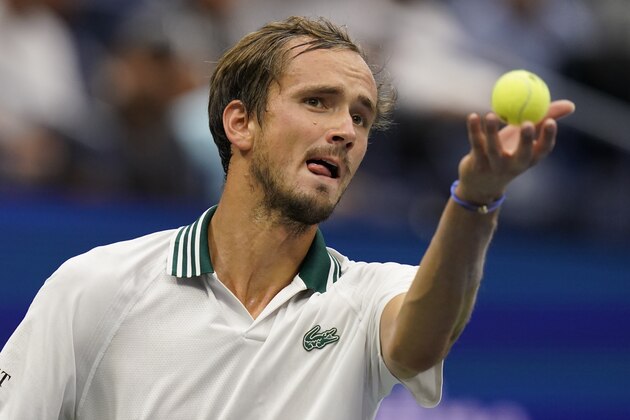Daniil Medvedev, of Russia, serves to Daniel Evans, of the United Kingdom, during the fourth round of the US Open tennis championships, Sunday, Sept. 5, 2021, in New York. (AP Photo/Seth Wenig)