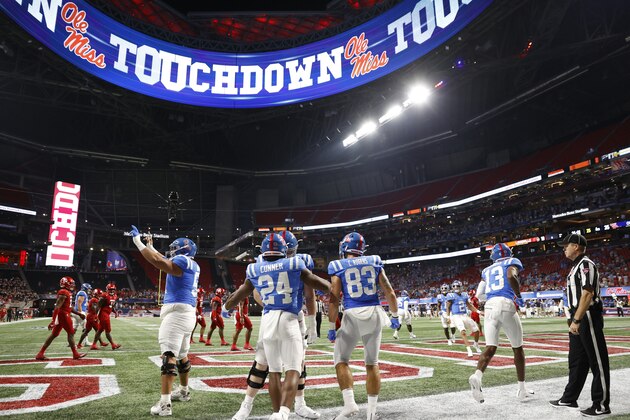 ATLANTA, GA - SEPTEMBER 06: Mississippi Rebels running back Snoop Conner (24) celebrates with teammates after rushing for an 11-yard touchdown in the fourth quarter of the Chick-Fil-A Kickoff game against the Louisville Cardinals on Sept. 6, 2021 at Mercedes-Benz Stadium in Atlanta, Georgia. (Photo by Joe Robbins/Icon Sportswire via Getty Images)