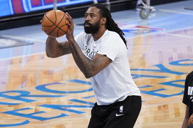 Brooklyn Nets center DeAndre Jordan warms up before the start of an NBA basketball game against the Portland Trail Blazers, Friday, April 30, 2021, in New York. (AP Photo/Mary Altaffer)