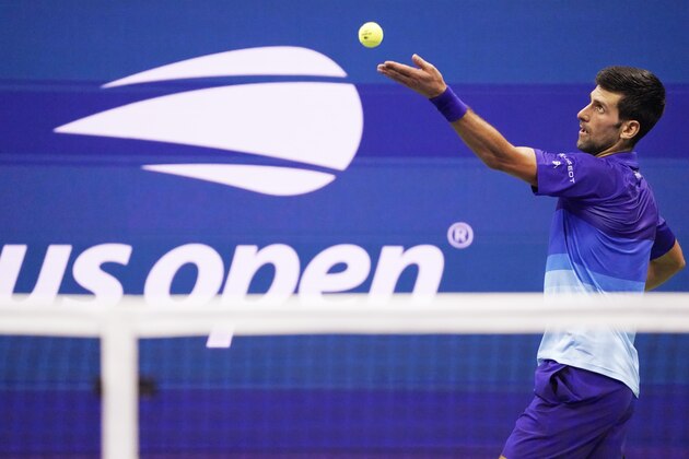 Novak Djokovic, of Serbia, serves against Jenson Brooksby, of the United States, during the fourth round of the US Open tennis championships, Monday, Sept. 6, 2021, in New York. (AP Photo/John Minchillo)
