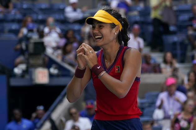 Emma Raducanu, of Great Britain, reacts after defeating Belinda Bencic, of Switzerland, during the quarterfinals of the US Open tennis championships, Wednesday, Sept. 8, 2021, in New York. (AP Photo/Elise Amendola)