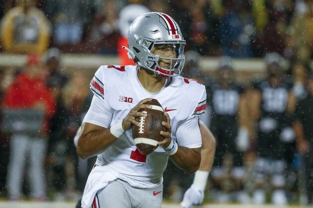 Ohio State quarterback C.J. Stroud (7) looks to pass against Minnesota in the third quarter of an NCAA college football game Thursday, Sept. 2, 2021, in Minneapolis. Ohio State won 45-31. (AP Photo/Bruce Kluckhohn)