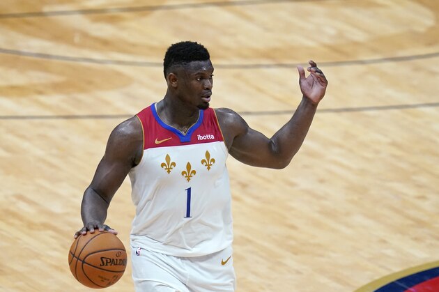 New Orleans Pelicans forward Zion Williamson (1) moves the ball up court in the second half of an NBA basketball game against the Golden State Warriors in New Orleans, Tuesday, May 4, 2021. (AP Photo/Gerald Herbert)
