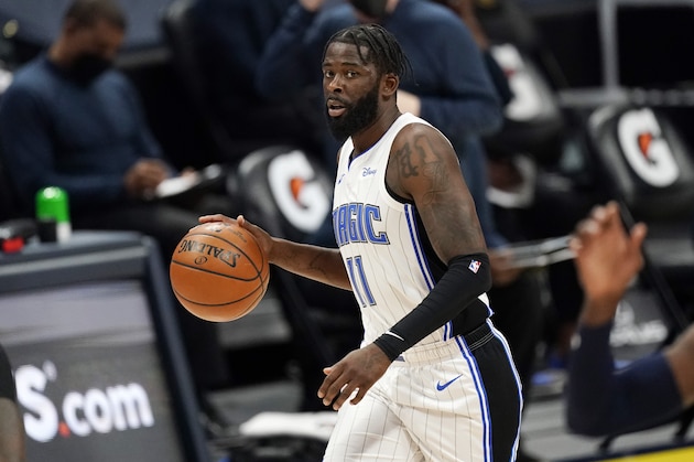 Orlando Magic forward James Ennis III (11) in the first half of an NBA basketball game Sunday, April 4, 2021, in Denver. (AP Photo/David Zalubowski)