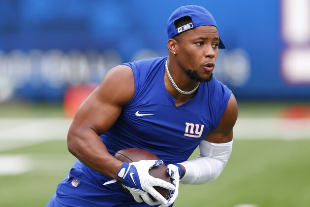 New York Giants running back Saquon Barkley warms up before an NFL preseason football game against the New England Patriots Sunday, Aug. 29, 2021, in East Rutherford, N.J. (AP Photo/Noah K. Murray)