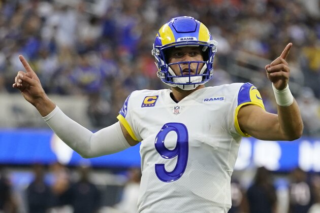 Los Angeles Rams quarterback Matthew Stafford motions during the first half of an NFL football game against the Chicago Bears, Sunday, Sept. 12, 2021, in Inglewood, Calif. (AP Photo/Marcio Jose Sanchez)