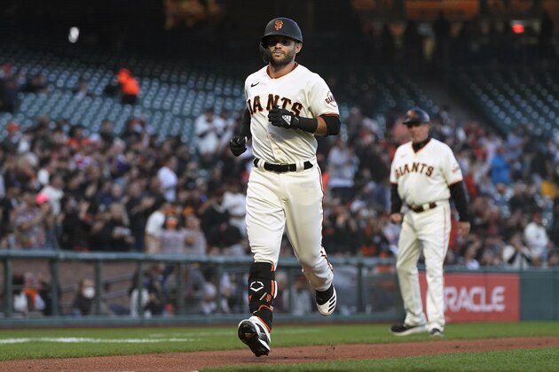 San Francisco Giants' Tommy La Stella jogs toward the plate after hitting a home run against the San Diego Padres during the first inning of a baseball game in San Francisco, Monday, Sept. 13, 2021. (AP Photo/Jeff Chiu)