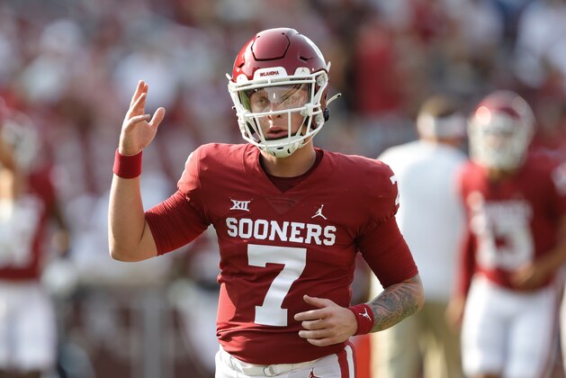 Oklahoma quarterback Spencer Rattler gestures before the team's NCAA college football game against Western Carolina on Saturday, Sept. 11, 2021, in Norman, Okla. (AP Photo/Alonzo Adams)