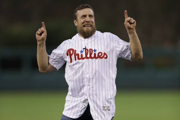 Professional wrestler Daniel Bryan throws out a pitch before a baseball game between the Philadelphia Phillies and the Pittsburgh Pirates, Monday, Sept. 12, 2016, in Philadelphia. (AP Photo/Matt Slocum)