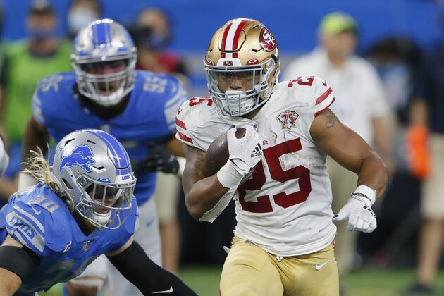 San Francisco 49ers running back Elijah Mitchell runs the ball against the Detroit Lions in the second half of an NFL football game in Detroit, Sunday, Sept. 12, 2021. (AP Photo/Duane Burleson)