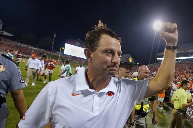 Clemson head coach Dabo Swinney pumps his fist to the crowd as he leaves the field after defeating Georgia Tech 14-8 in an NCAA college football game, Saturday, Sept. 18, 2021, in Clemson, S.C. (AP Photo/John Bazemore)