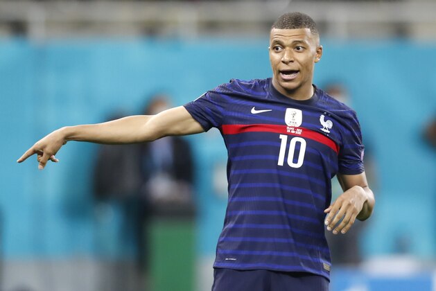France's Kylian Mbappe reacts after missing a scoring chance the Euro 2020 soccer championship round of 16 match between France and Switzerland at the National Arena stadium in Bucharest, Romania, Tuesday, June 29, 2021. (Robert Ghement/Pool via AP)