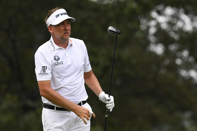 Ian Poulter, of England, watches his shot during the final round in the World Golf Championship-FedEx St. Jude Invitational tournament, Sunday, Aug. 8, 2021, in Memphis, Tenn. (AP Photo/John Amis)