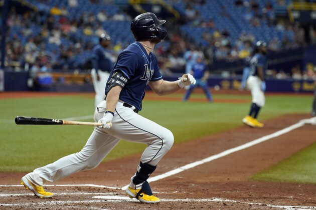 Tampa Bay Rays' Austin Meadows watches his three-run home run off Toronto Blue Jays pitcher Ross Stripling during the third inning of a baseball game Wednesday, Sept. 22, 2021, in St. Petersburg, Fla. (AP Photo/Chris O'Meara)