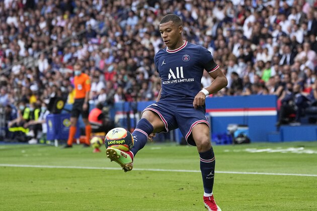 PSG's Kylian Mbappe in action during the French League One soccer match between Paris Saint-Germain and Clermont at the Parc des Princes stadium in Paris, France, Saturday, Sept. 11, 2021. (AP Photo/Michel Euler)