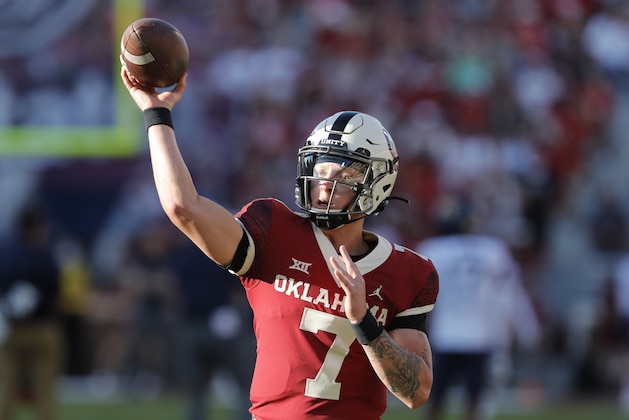 Oklahoma quarterback Spencer Rattler (7) warms up before the start of a game against West Virginia in Norman, Okla., Saturday, Sep. 25, 2021. (AP Photo/Alonzo Adams)