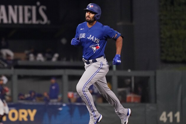 Toronto Blue Jays' Marcus Semien rounds the bases on his solo home run off Minnesota Twins pitcher Bailey Ober in the sixth inning of a baseball game, Friday, Sept. 24, 2021, in Minneapolis. (AP Photo/Jim Mone)