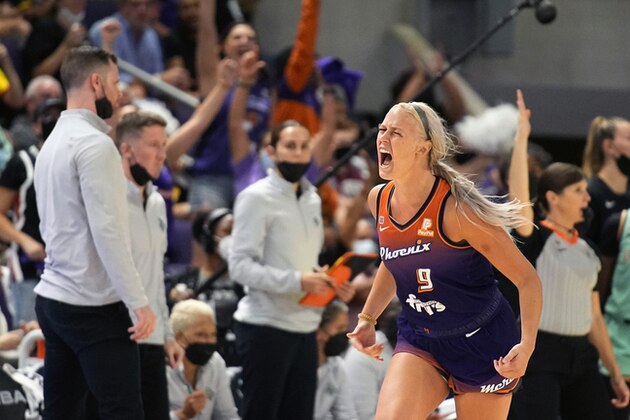 Phoenix Mercury guard Sophie Cunningham (9) reacts after scoring during the second half in the first round of the WNBA basketball playoffs against the Phoenix Mercury, Thursday, Sept. 23, 2021, in Phoenix. Phoenix won 83-82. (AP Photo/Rick Scuteri)