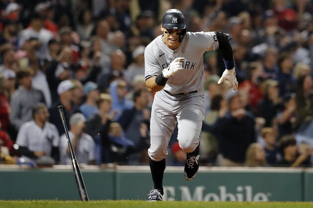 New York Yankees' Aaron Judge runs on his two-run double during the eighth inning of a baseball game against the Boston Red Sox, Sunday, Sept. 26, 2021, in Boston. (AP Photo/Michael Dwyer)