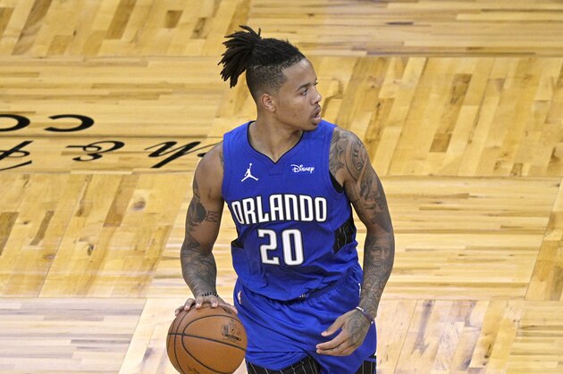 Orlando Magic guard Markelle Fultz (20) sets up a play during the second half of an NBA basketball game against the Oklahoma City Thunder, Saturday, Jan. 2, 2021, in Orlando, Fla. (AP Photo/Phelan M. Ebenhack)