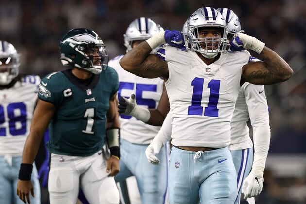 ARLINGTON, TEXAS - SEPTEMBER 27: Micah Parsons #11 of the Dallas Cowboys celebrates a sack of Jalen Hurts #1 of the Philadelphia Eagles at AT&T Stadium on September 27, 2021 in Arlington, Texas. (Photo by Tom Pennington/Getty Images)