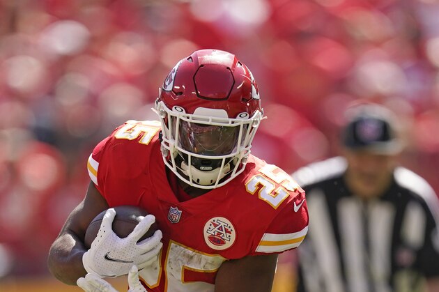Kansas City Chiefs' Clyde Edwards-Helaire (25) runs during the first half of an NFL football game against the Los Angeles Chargers, Sunday, Sept. 26, 2021, in Kansas City, Mo. (AP Photo/Charlie Riedel)