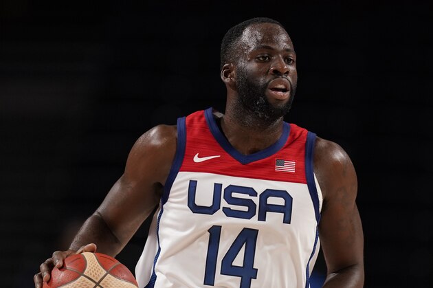 United States' Draymond Green (14) drives to the basket during men's basketball preliminary round game against Iran at the 2020 Summer Olympics, Wednesday, July 28, 2021, in Saitama, Japan. (AP Photo/Charlie Neibergall)