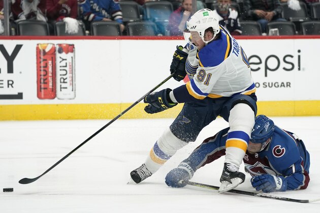 St. Louis Blues right wing Vladimir Tarasenko, front, drives to the net with the puck past Colorado Avalanche defenseman Devon Toews in the first period of Game 1 of an NHL hockey Stanley Cup first-round playoff series Monday, May 17, 2021, in Denver. (AP Photo/David Zalubowski) St. Louis Blues right wing Vladimir Tarasenko, front, drives to the net with the puck past Colorado Avalanche defenseman Devon Toews in the first period of Game 1 of an NHL hockey Stanley Cup first-round playoff series Monday, May 17, 2021, in Denver. (AP Photo/David Zalubowski)
