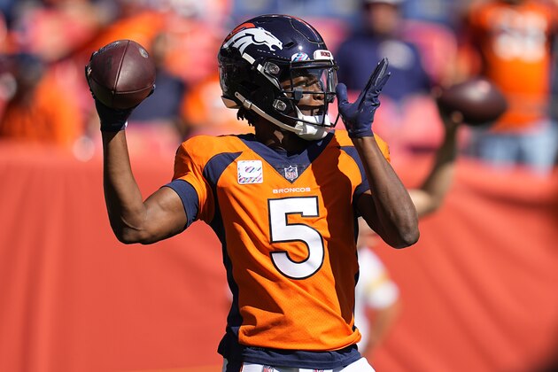 Denver Broncos quarterback Teddy Bridgewater (5) warms up prior to an NFL football game against the Baltimore Ravens, Sunday, Oct. 3, 2021, in Denver. (AP Photo/Jack Dempsey)