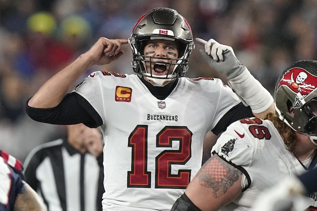 Tampa Bay Buccaneers quarterback Tom Brady (12) calls out a play at the line of scrimmage during the second half of an NFL football game against the New England Patriots, Sunday, Oct. 3, 2021, in Foxborough, Mass. (AP Photo/Steven Senne)