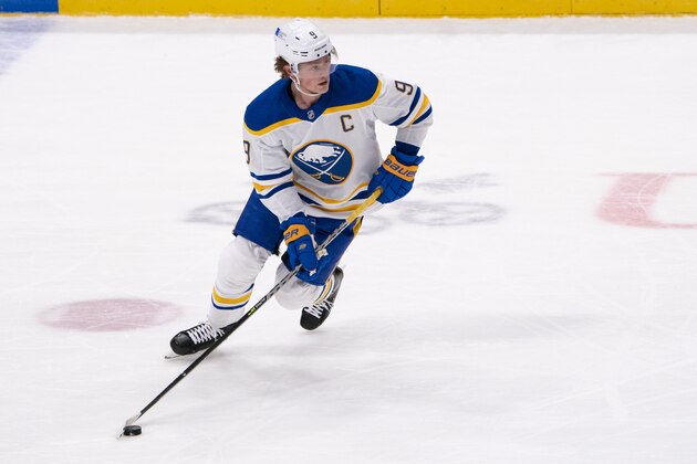 UNIONDALE, NY - MARCH 07: Buffalo Sabres Center Jack Eichel (9) skates with the puck during the second period of the National Hockey League game between the Buffalo Sabres and the New York Islanders on March 7, 2021, at the Nassau Veterans Memorial Coliseum in Uniondale, NY. (Photo by Gregory Fisher/Icon Sportswire via Getty Images)