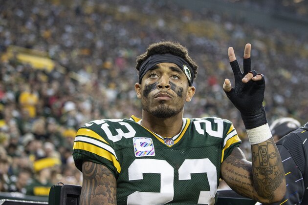 Green Bay Packers cornerback Jaire Alexander (23) waves to the fans as he is carted off the field against the Pittsburgh Steelers during an NFL football game Sunday, Oct 3. 2021, in Green Bay, Wis. (AP Photo/Jeffrey Phelps)