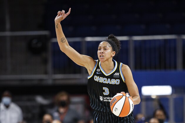 Chicago Sky center Candace Parker brings the ball up court against the Dallas Wings during the first half in the first round of the WNBA basketball playoffs, Thursday, Sept. 23, 2021, in Chicago. (AP Photo/Kamil Krzaczynski) Chicago Sky center Candace Parker brings the ball up court against the Dallas Wings during the first half in the first round of the WNBA basketball playoffs, Thursday, Sept. 23, 2021, in Chicago. (AP Photo/Kamil Krzaczynski)