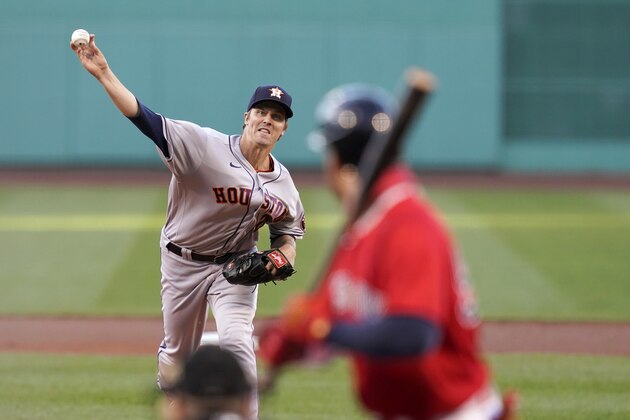 Houston Astros starting pitcher Zack Greinke delivers to Boston Red Sox's Alex Verdugo during the first inning of a baseball game at Fenway Park, Thursday, June 10, 2021, in Boston. (AP Photo/Elise Amendola)