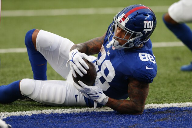 New York Giants tight end Evan Engram (88) is stopped short of the end zone during the first half of an NFL preseason football game against the New England Patriots Sunday, Aug. 29, 2021, in East Rutherford, N.J. (AP Photo/Noah K. Murray)