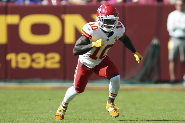 Kansas City Chiefs wide receiver Tyreek Hill (10) runs during an NFL football game against the Washington Football Team, Sunday, Oct. 17, 2021 in Landover, Md. (AP Photo/Daniel Kucin Jr.)