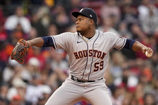 Houston Astros starting pitcher Framber Valdez throws against the Boston Red Sox during the first inning in Game 5 of baseball's American League Championship Series Wednesday, Oct. 20, 2021, in Boston. (AP Photo/David J. Phillip)