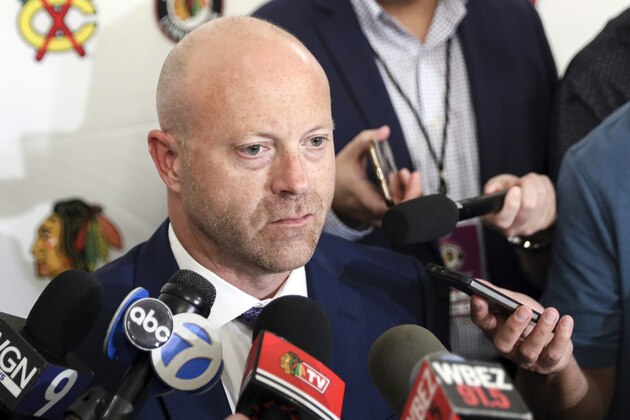 FILE- In this July 26, 2019, file photo, Chicago Blackhawks senior vice president and general manager Stan Bowman speaks to the media during the NHL hockey team's convention in Chicago. Bowman resigned Tuesday, Oct. 26, 2021, following an investigation into allegations that an assistant coach sexually assaulted a player in 2010. (AP Photo/Amr Alfiky, File) FILE- In this July 26, 2019, file photo, Chicago Blackhawks senior vice president and general manager Stan Bowman speaks to the media during the NHL hockey team's convention in Chicago. Bowman resigned Tuesday, Oct. 26, 2021, following an investigation into allegations that an assistant coach sexually assaulted a player in 2010. (AP Photo/Amr Alfiky, File)