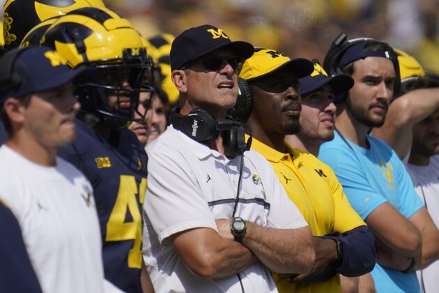 Michigan head coach Jim Harbaugh watches against Northern Illinois in the first half of a NCAA college football game in Ann Arbor, Mich., Saturday, Sept. 18, 2021. (AP Photo/Paul Sancya)