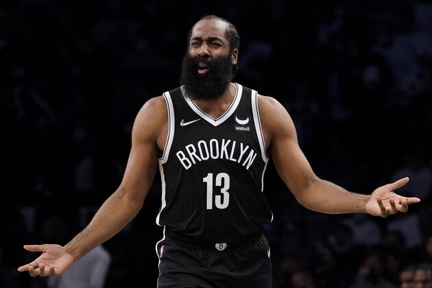 Brooklyn Nets guard James Harden reacts to a play call during the second half of an NBA basketball game against the Charlotte Hornets, Sunday, Oct. 24, 2021, in New York. (AP Photo/John Minchillo)