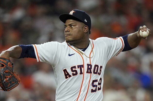Houston Astros starting pitcher Framber Valdez throws during the first inning of Game 1 in baseball's World Series between the Houston Astros and the Atlanta Braves Tuesday, Oct. 26, 2021, in Houston. (AP Photo/David J. Phillip)